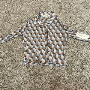 Brand new! Long sleeve see through top.
